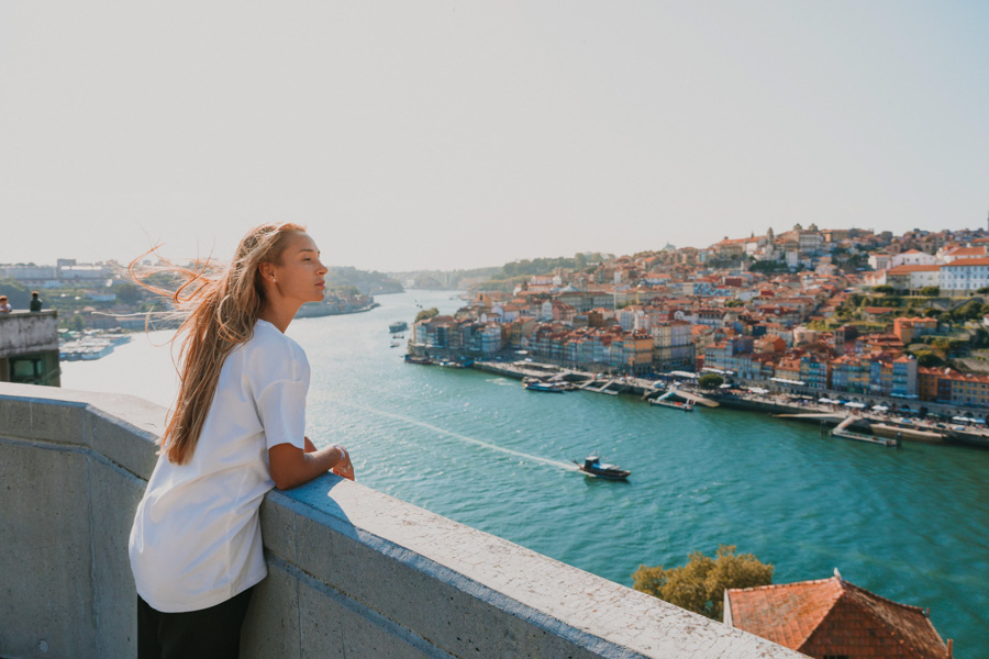 Irina gazing at Douro river in Porto